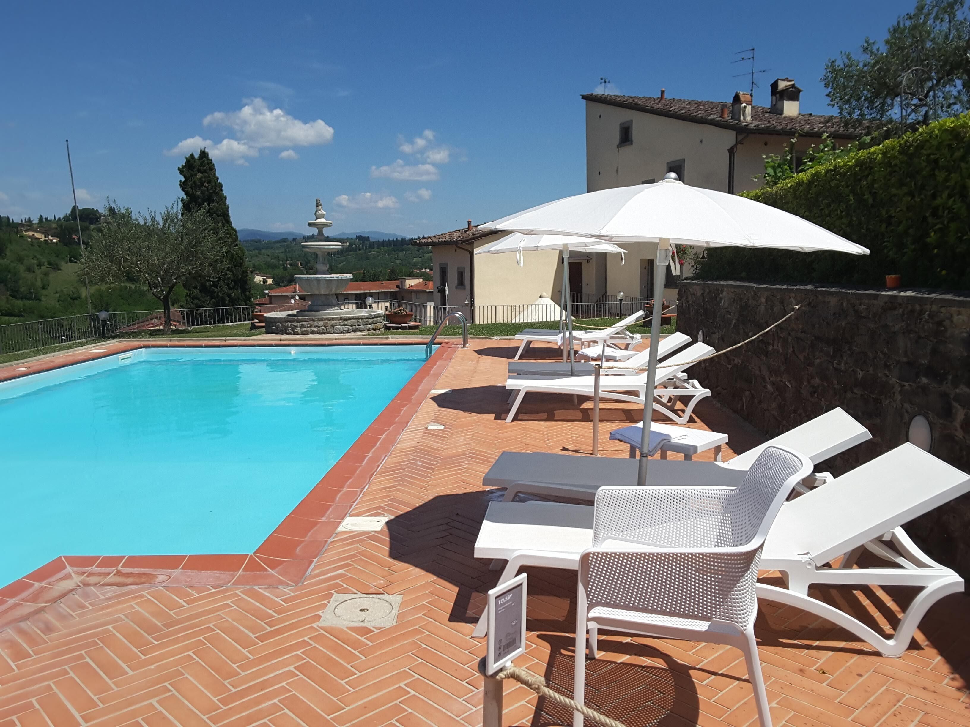 Seasonal outdoor pool, pool umbrellas, sun loungers