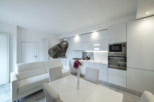 Deluxe Apartment, 1 Bedroom, Non Smoking, Kitchen | Living area | Flat-screen TV