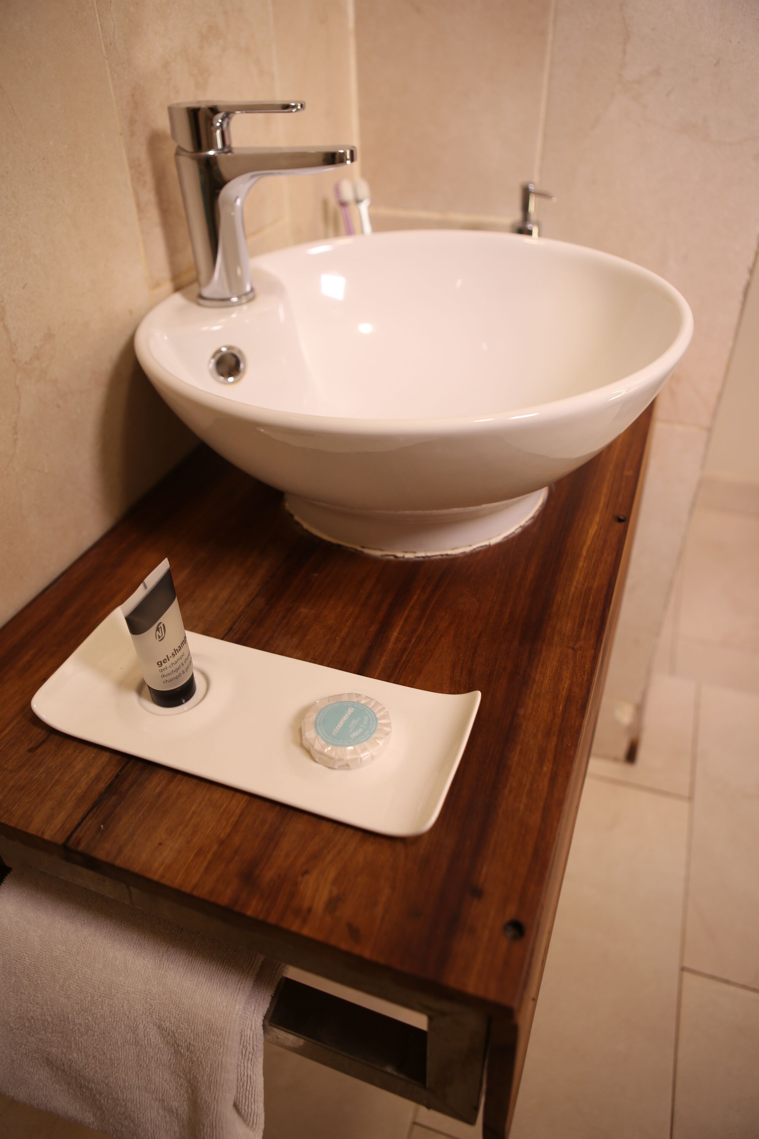 shower, rainfall showerhead, hair dryer, towels