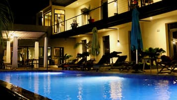 Outdoor pool, pool umbrellas, sun loungers
