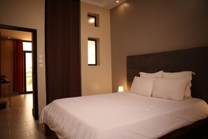 Suíte premium | Roupas de cama premium, cortinas blackout, quartos à prova de som