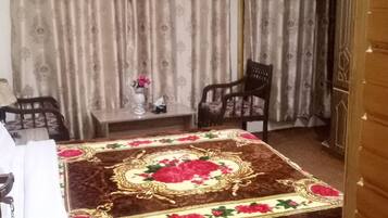 Chambre Deluxe | Matelas mémoire de forme, bureau