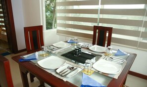 Breakfast, lunch, dinner served; local cuisine