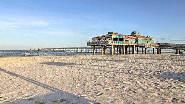 A beachside pier with a building labeled "Mike's." - Corpus Christi Condo - Walk to Whitecap Beach! (Corpus Christi)