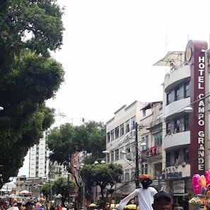 A hotel with a prominent sign reading "HOTEL CAMPO GRANDE".