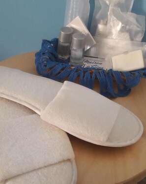 Hair dryer, towels, soap, shampoo