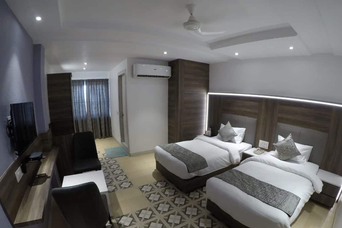 Camera Executive con letto matrimoniale o 2 letti singoli | Una cassaforte in camera, ferro/asse da stiro, Wi-Fi gratuito, lenzuola