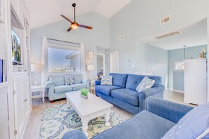 Televisio, DVD-soitin, kirjoja, videokirjasto