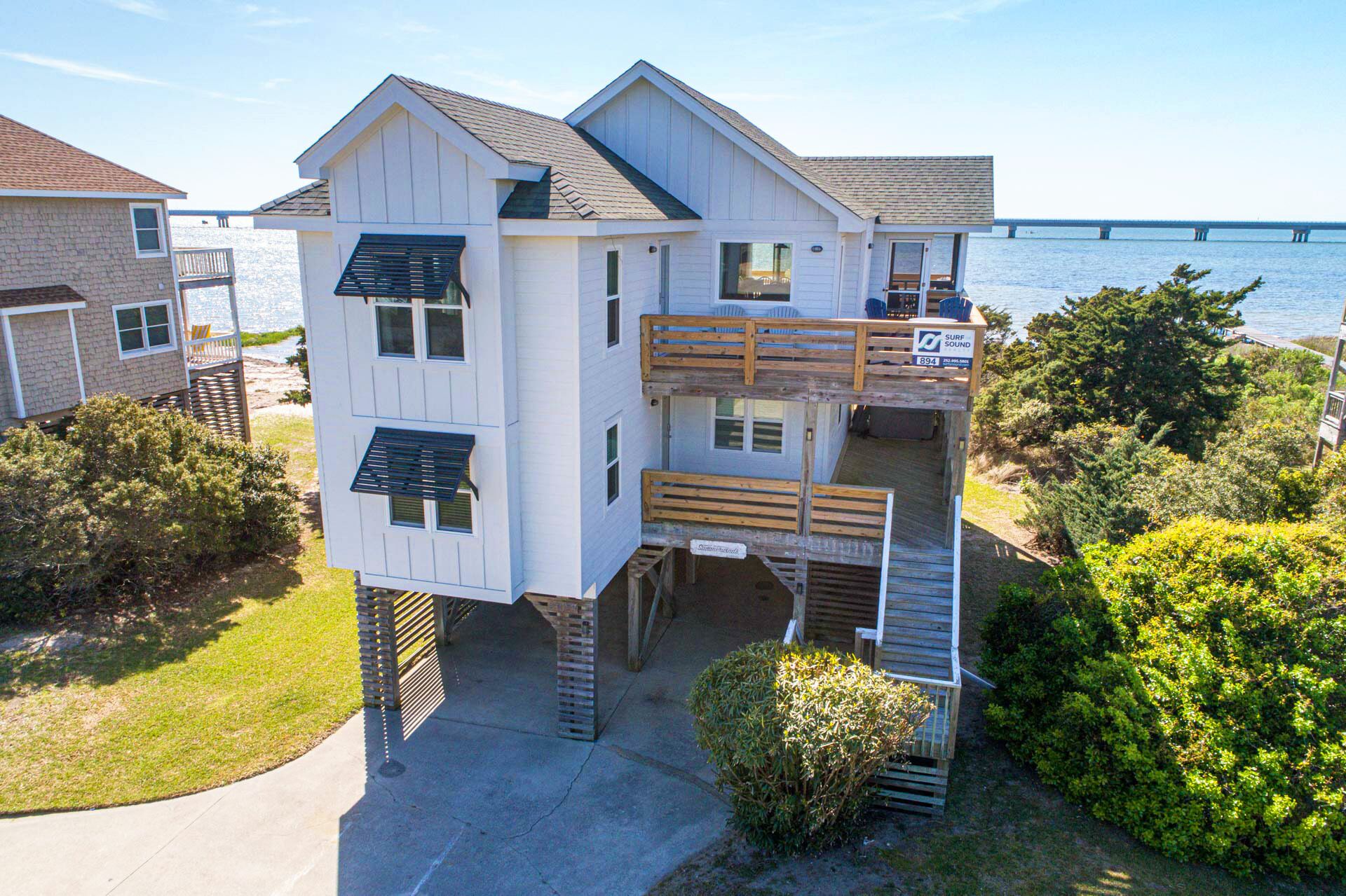 Soundfront + Dog Friendly Home w/ Hot Tub, Windsports Access, Private Boardwalk