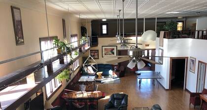 Stay in a unique and original Old Town Hall with hardwood floors..