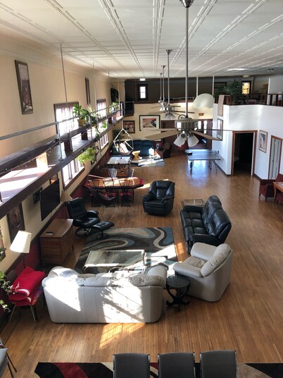 Stay in a unique and original Old Town Hall with hardwood floors..