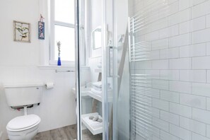 Shower, free toiletries, hair dryer, towels