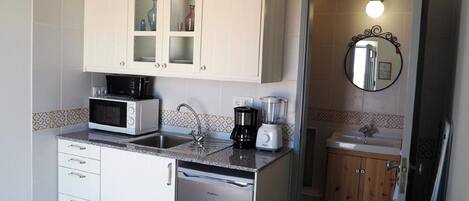 Fridge, microwave, coffee/tea maker, electric kettle