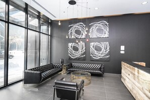 Relax in style at our reception area, featuring a comfortable sofa and a stylish coffee table.