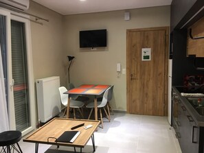 City Apartment, 1 Bedroom, Garden View | Living area | Flat-screen TV - Sofie's Choice Mytilini (Lesvos)
