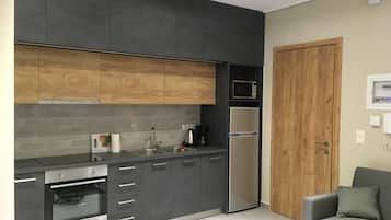 City Apartment, 1 Bedroom (Street View) | Private kitchen | Full-size fridge, microwave, oven, stovetop