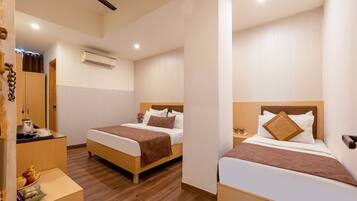 Habitación Deluxe | Ropa de cama de alta calidad, edredón y camas con pillow-top