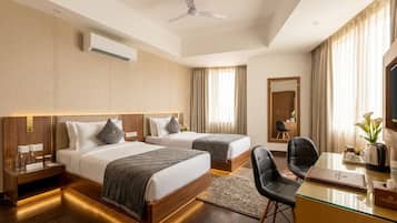 Deluxe Room | Premium bedding, down duvets, pillow-top beds, individually decorated
