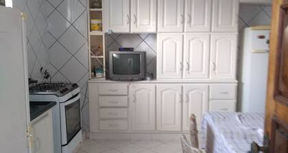 Room with two beds in pensionato in MaringĂĄ / pr