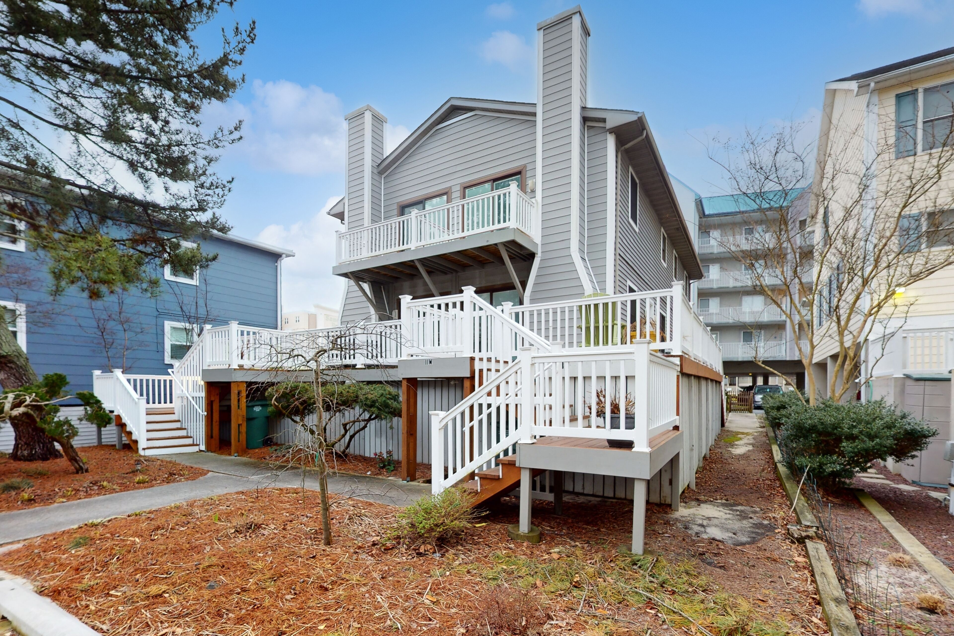 Spacious Two-Story Condo w/Deck, Balcony, Beach Access, Free WiFi, Central A/C