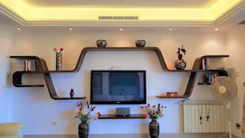 Apartment, 2 Bedrooms | Living area | 50-inch LCD TV with satellite channels, TV, Netflix