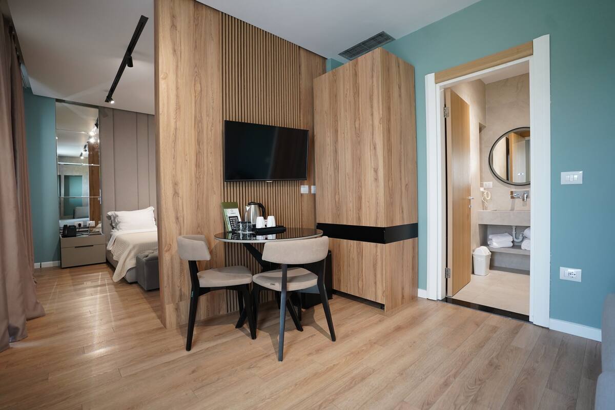 Deluxe King Suite | Premium bedding, memory foam beds, in-room safe, desk