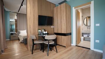 Deluxe King Suite | Premium bedding, memory-foam beds, in-room safe, desk