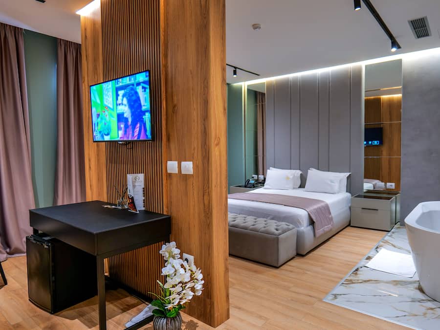 Deluxe King Suite | Premium bedding, memory foam beds, in-room safe, desk