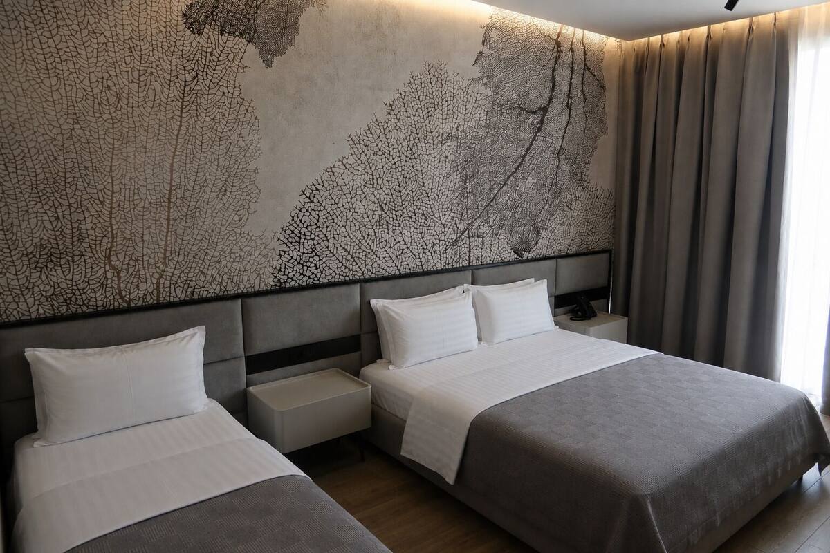 Premium bedding, memory foam beds, in-room safe, desk