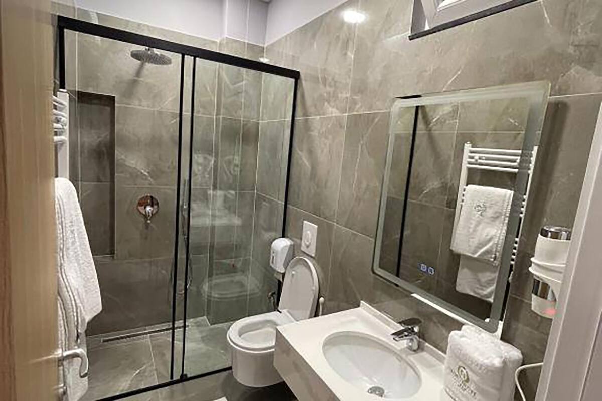 free toiletries, hair dryer, slippers, towels