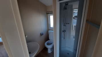 Shower, towels, toilet paper
