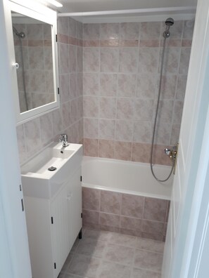 Hair dryer, towels, soap, shampoo