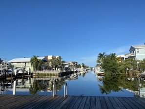 Waterfront views of calm waters and surrounding buildings.