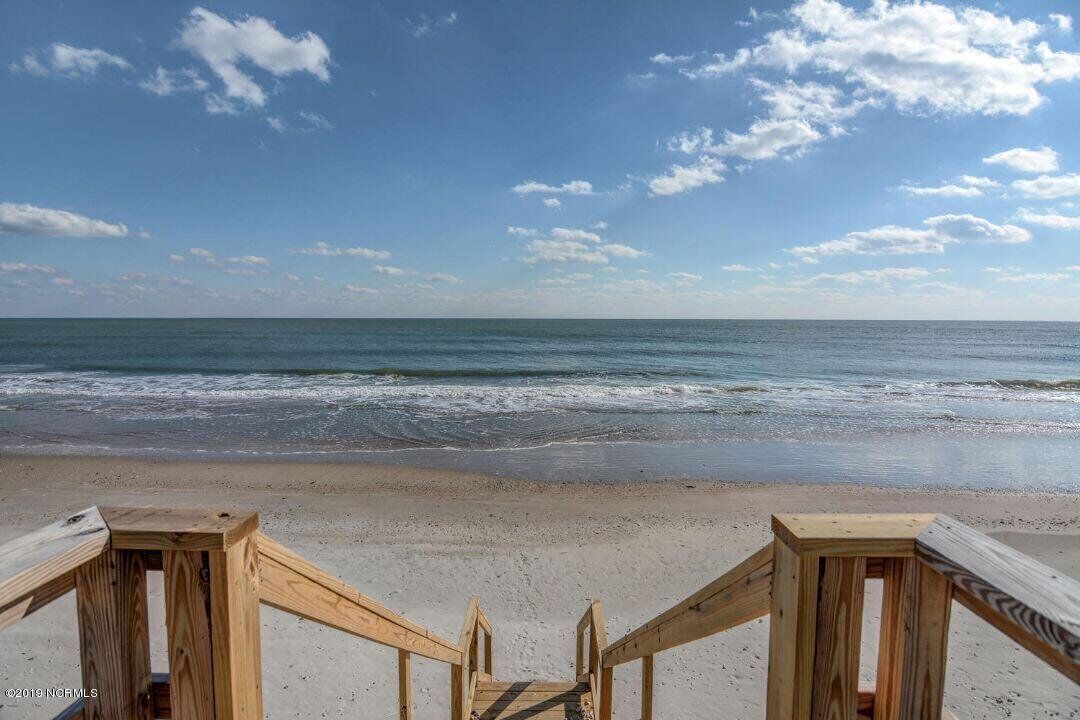 On the beach, sun-loungers