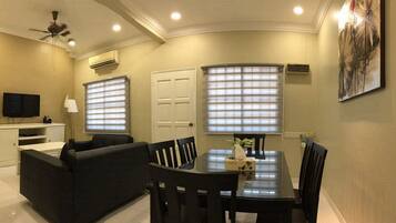 Townhouse, 3 Bedrooms | Living area | Flat-screen TV