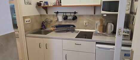 Fridge, microwave, electric kettle, toaster