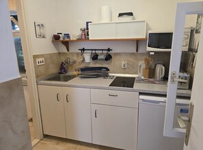 Fridge, microwave, electric kettle, toaster