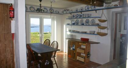 Beautiful house with garden that runs down to the sea