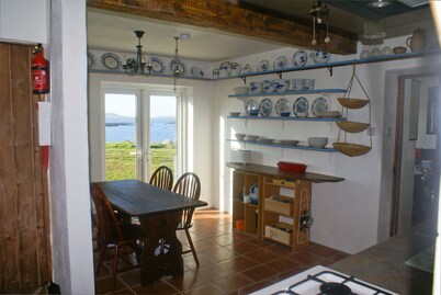 Beautiful house with garden that runs down to the sea