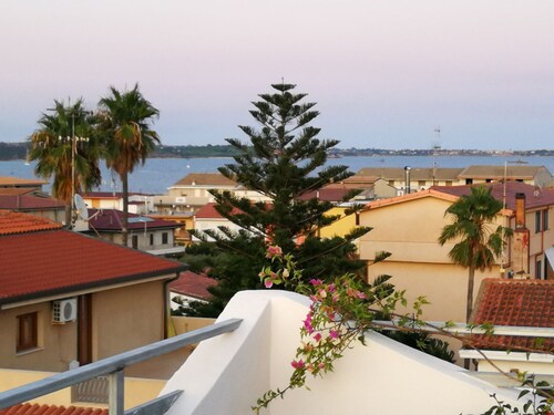 Apartment with panoramic terrace 2 steps from the sea.