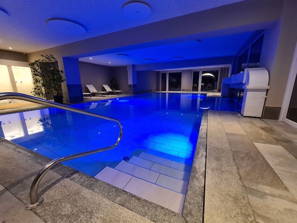 Indoor pool, outdoor pool, open 7:00 AM to 10:00 PM, pool umbrellas