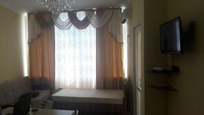 TV - Apartment with sea view in front of the beach (Kobuleti)