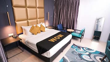 Premium bedding, free minibar items, in-room safe