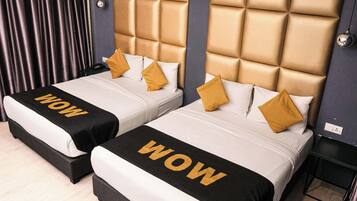 Premium bedding, free minibar items, in-room safe