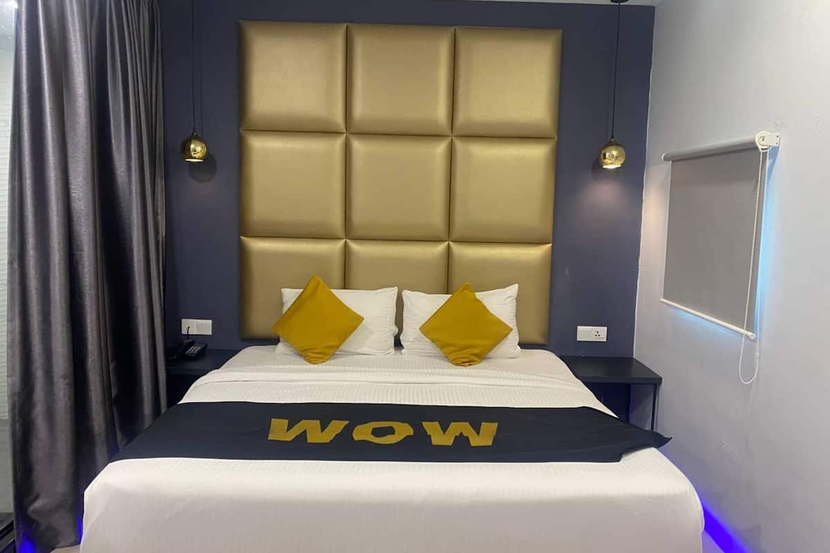 Habitación superior | Ropa de cama de alta calidad y artículos del minibar gratis