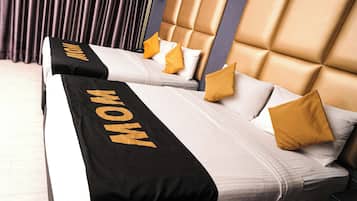 Habitación familiar (Suite) | Ropa de cama de alta calidad y artículos del minibar gratis