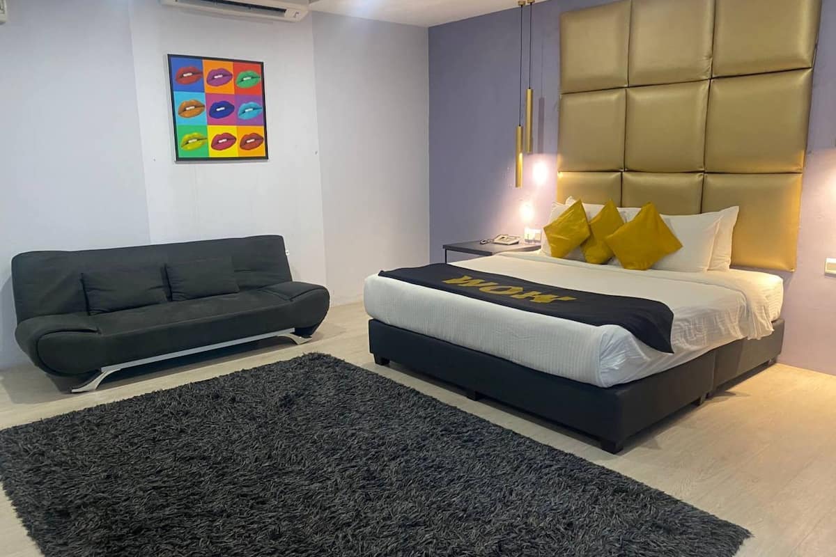 Suite presidencial | Ropa de cama de alta calidad y artículos del minibar gratis
