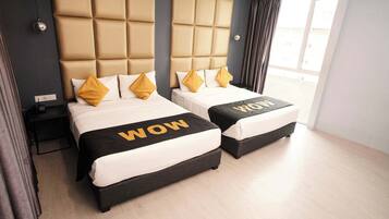 Premium bedding, free minibar items, in-room safe