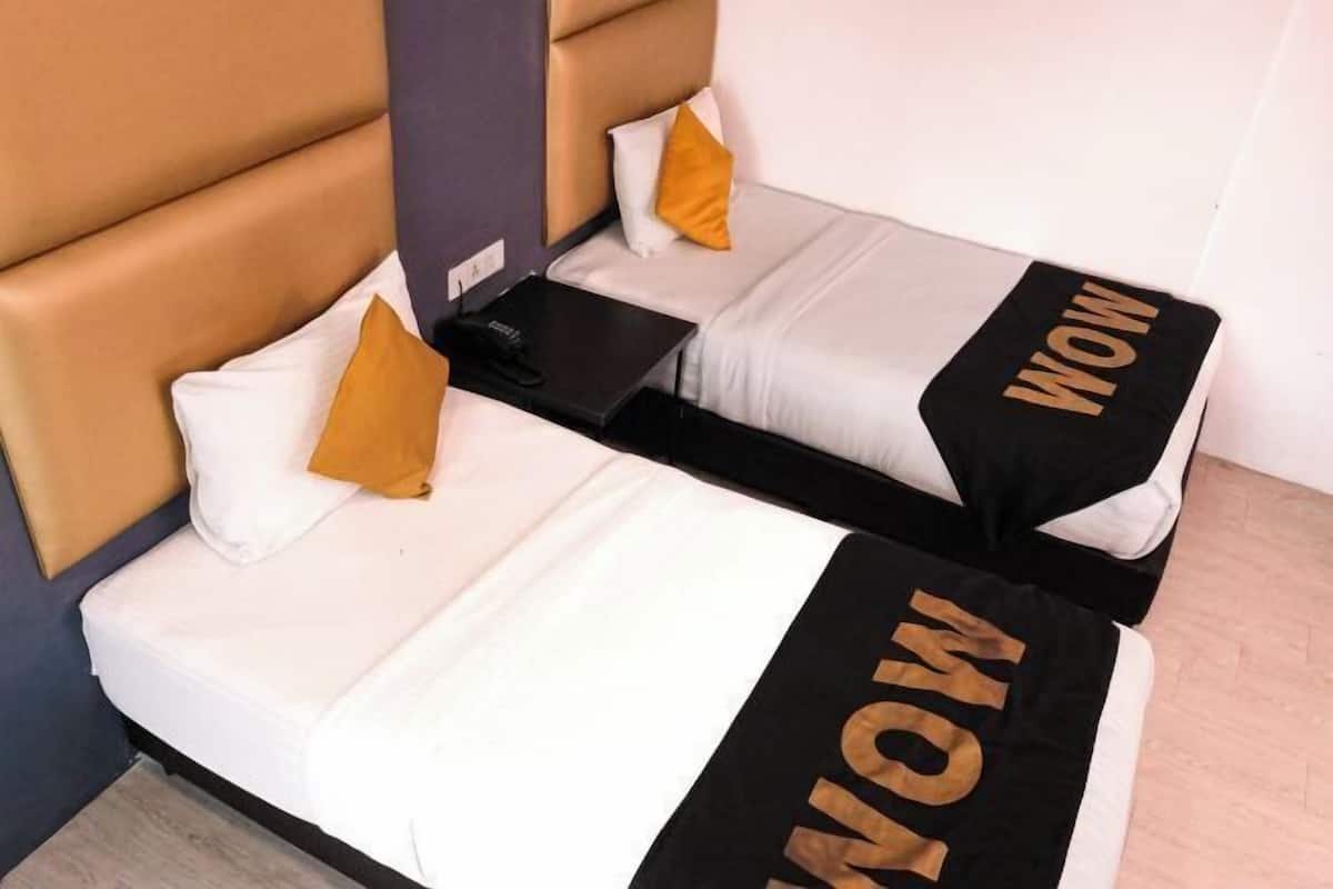 Premium bedding, free minibar items, in-room safe