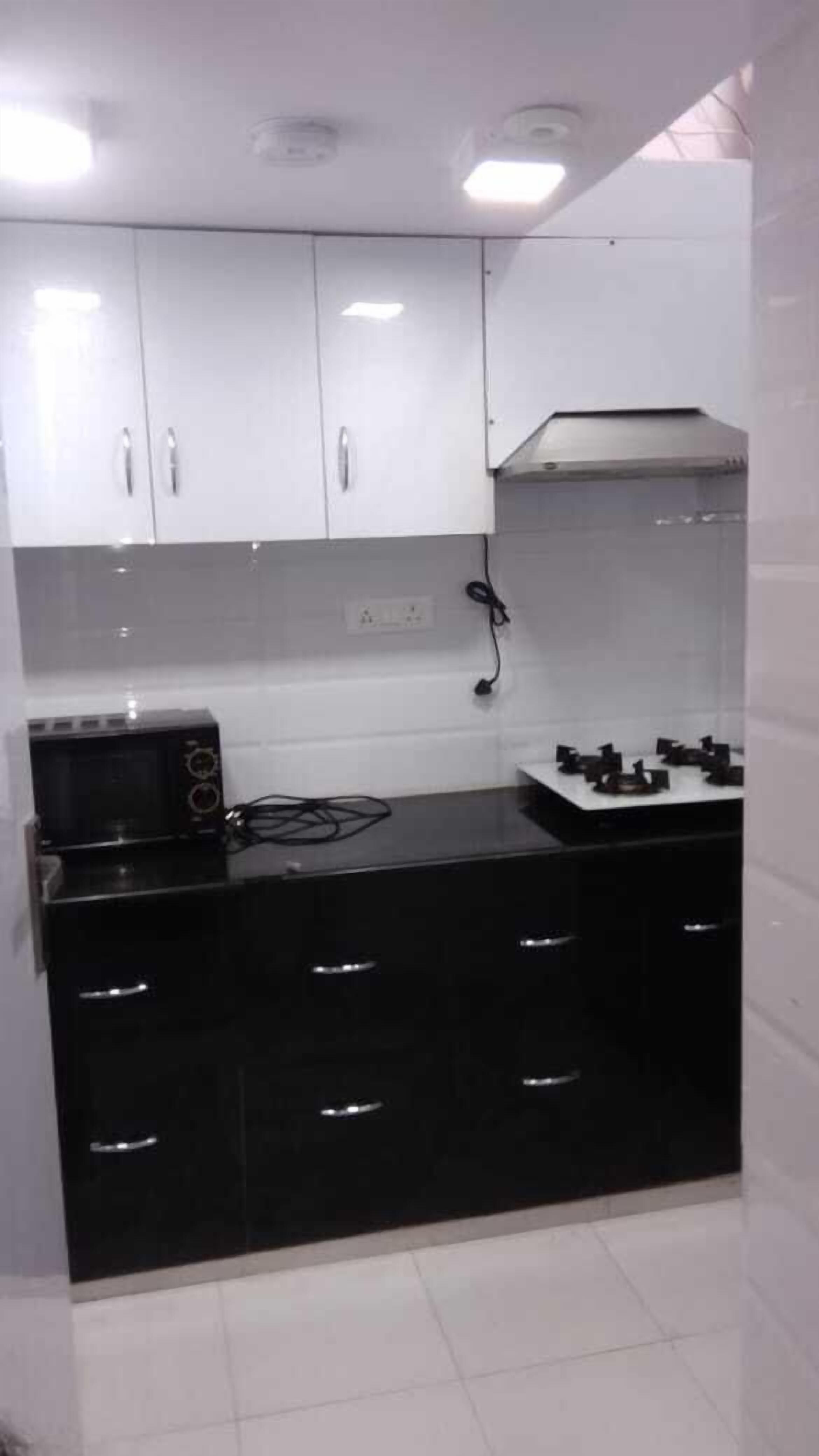 Deluxe Double Room, Non Smoking, City View | Shared kitchen | Microwave, stovetop, coffee/tea maker, electric kettle